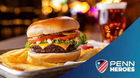 Burger with fries and PENN Hero logo